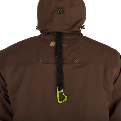 A person wearing the McAlister G3 Flex 3-in-1 Waterfowler's Jacket with versatile features for hunting in various weather conditions.