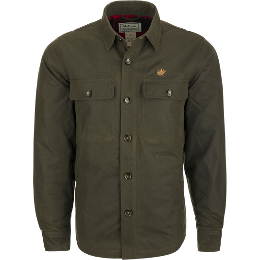 McAlister Waxed Cotton Jac-Shirt: A green shirt with buttons, featuring a heritage look and functional fit. Water and wind-resistant, with a bi-swing back pleat and fleece-lined hand pockets. Made of 100% cotton 8-oz dry wax shell and lined with 100% cotton flannel.
