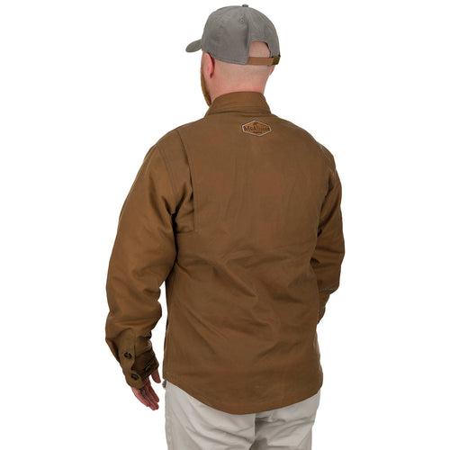 A man wearing the McAlister Waxed Cotton Jac-Shirt, a brown jacket with a hat, showcasing the heritage look and functional fit.