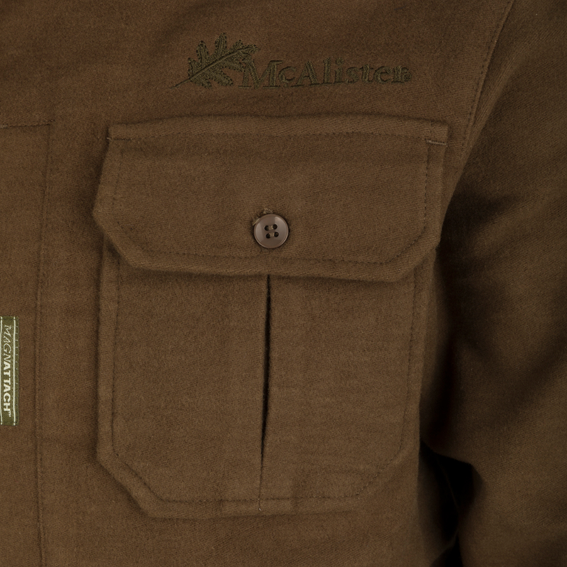 A close-up of the McAlister Windproof Moleskin Jac-Shirt's pocket and button, showcasing its durable design and functionality.
