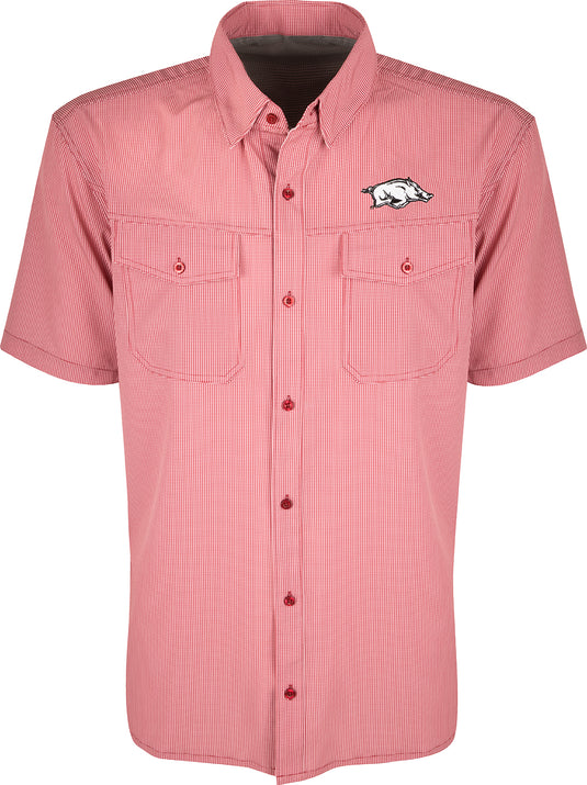 Arkansas S/S Traveler's Shirt: A lightweight, breathable plaid shirt with four-way stretch for freedom of movement. Features moisture-wicking fabric and two chest pockets with button flaps. Ideal for early season baseball games and weekend tailgates.