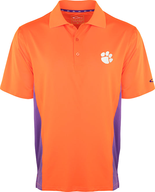 Clemson Performance Polo with Mesh Sides, an active shirt for Tiger fans. Moisture-wicking fabric and breathable mesh panels keep you cool. Official Clemson logo on left chest.