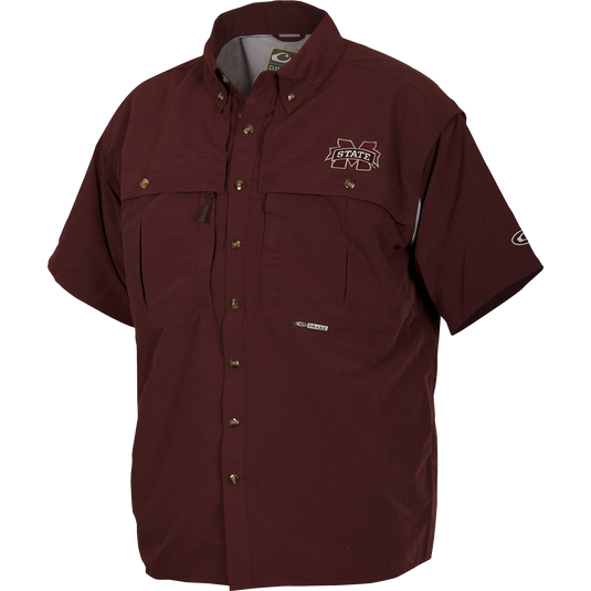 A breathable, quick-drying Mississippi State Wingshooter's Shirt with front and back ventilation. Features oversized chest pockets, Magnattach™ pocket, and zippered pocket.