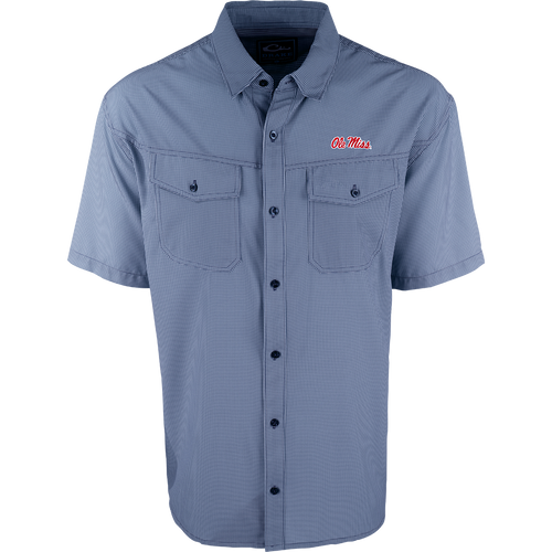 A blue and white striped shirt with four-way stretch for freedom of movement and ultimate comfort. Lightweight and wrinkle resistant, perfect for early season football games or weekend tailgates. Features moisture-wicking fabric and two chest pockets with button flaps. Ole Miss logo embroidered on the left chest.