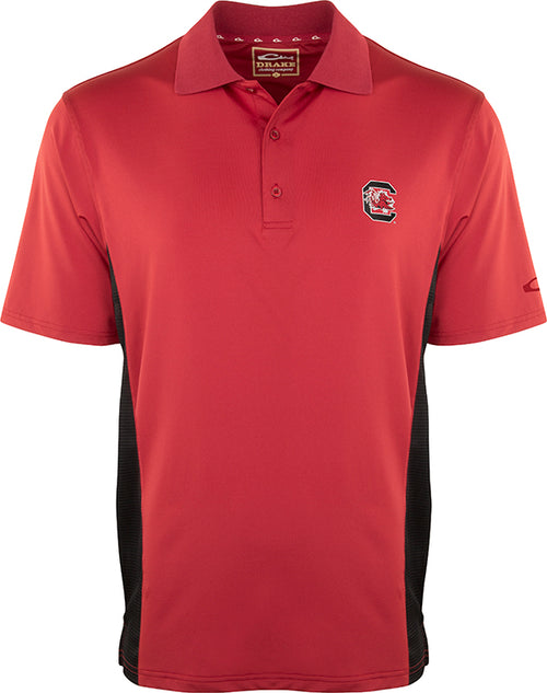 South Carolina Performance Polo with Mesh Sides featuring a red shirt with a logo. Moisture-wicking fabric and mesh panels for breathability.